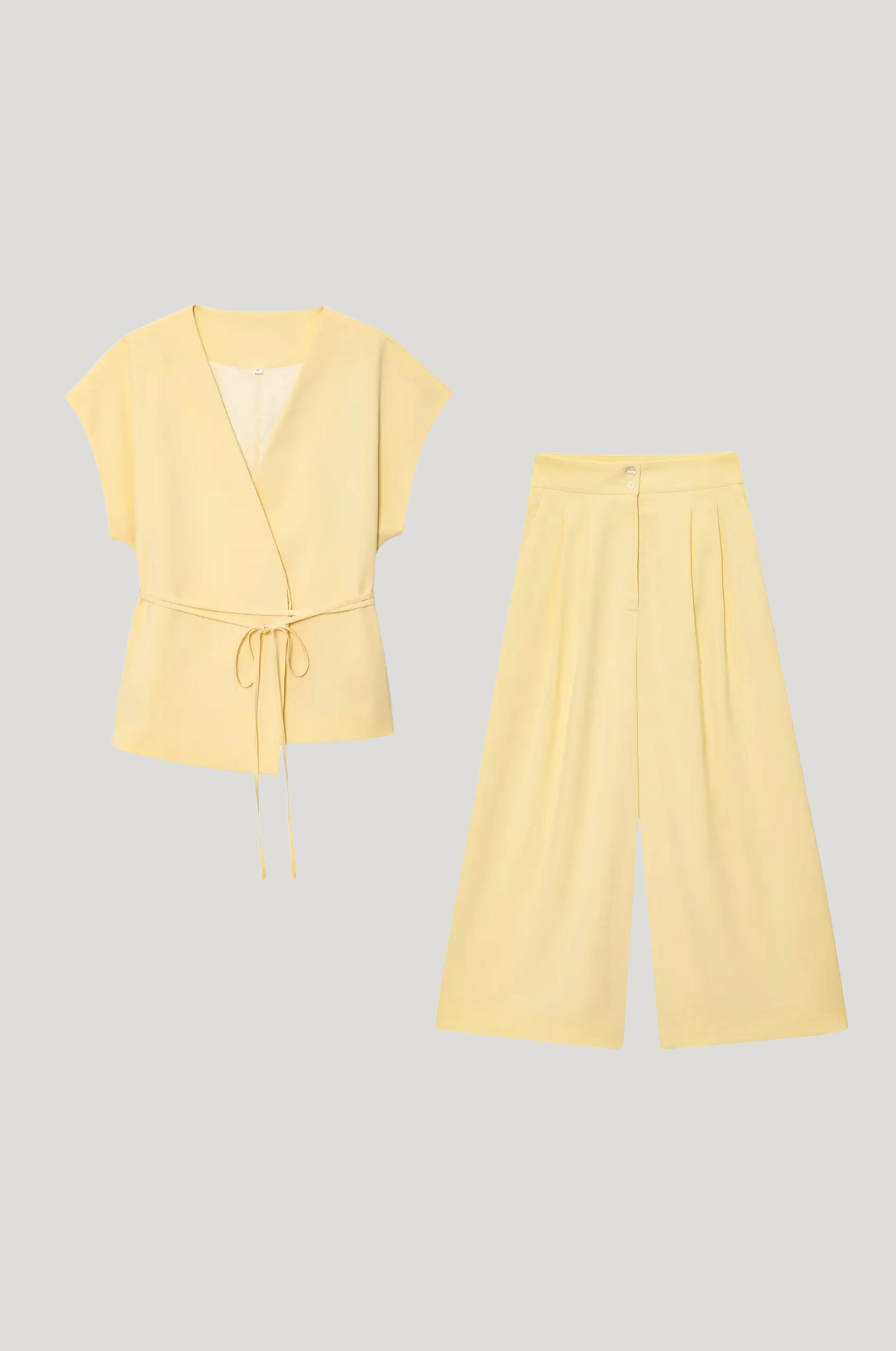 Mouwloos pak – V-hals & tailored