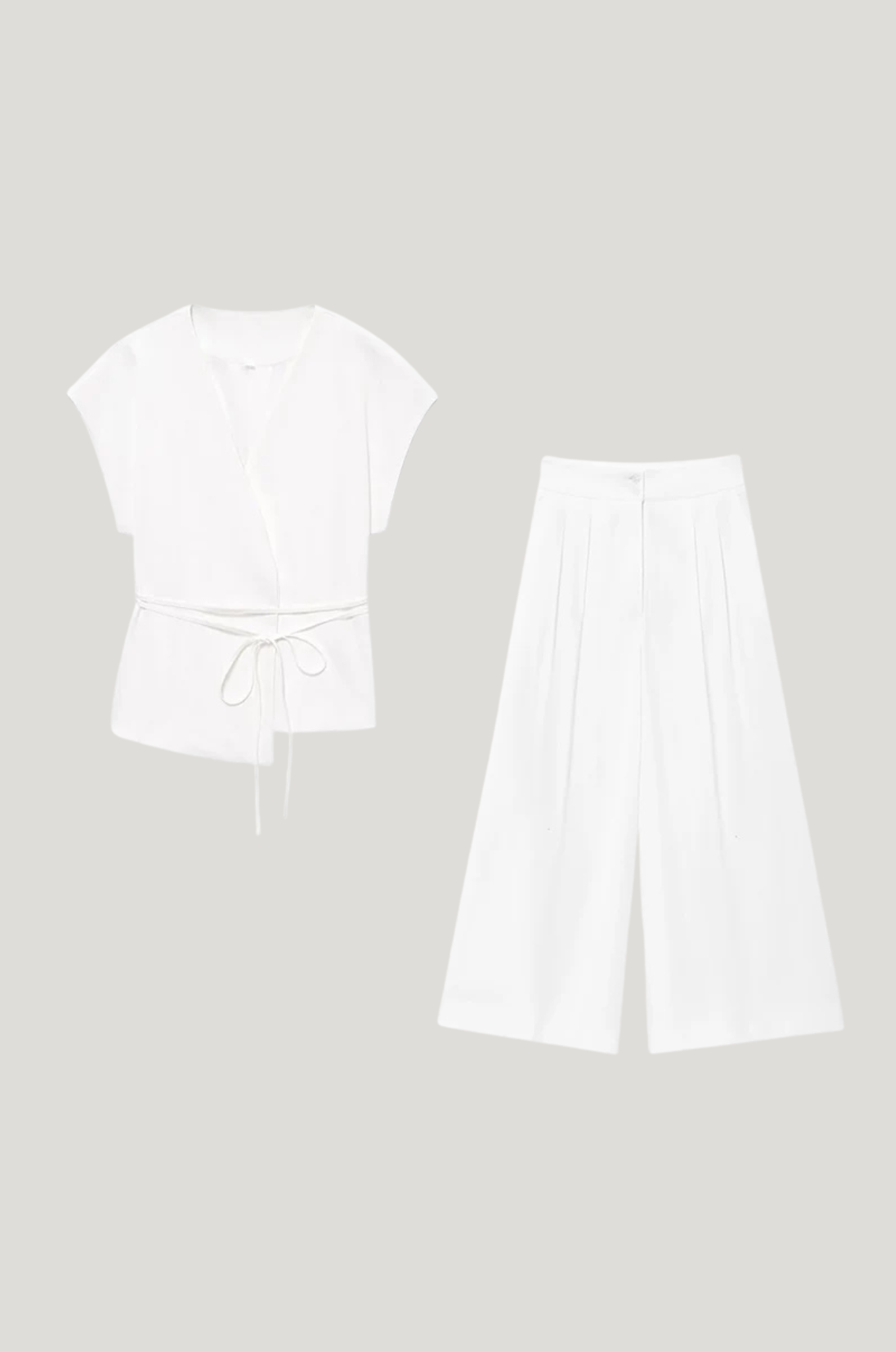 Mouwloos pak – V-hals & tailored